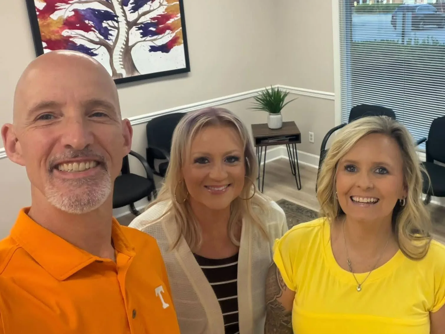 Dr. Jon Scott, chiropractor near Farragut, TN, with family in the Scott Chiropractic office