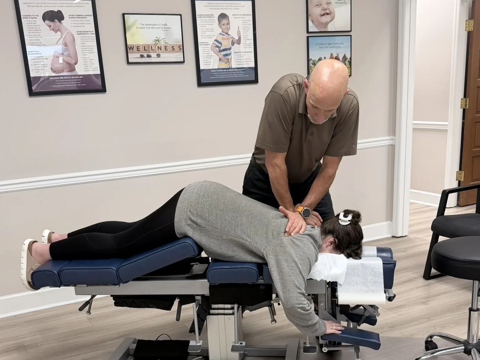 Dr. Jon Scott, chiropractor near Hardin Valley, TN, giving a gentle adjustment on a drop table
